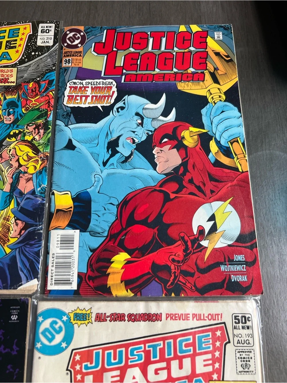 DC Comics Justice League of America Comic Covers - Red, Blue, Black, Yellow